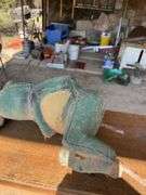 Two garden frog decorations