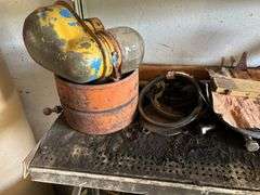 Four shelves of miscellaneous hardware and tools