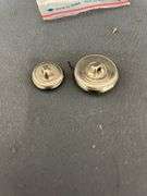 Two Silver-tone Heraldic Buttons