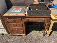 Wooden Desk with Print and Miscellaneous Items