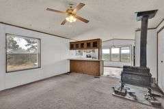Colorado Mountain Property Auction • 5± (Two- 2.5 acres tracts)1 with Mobile Home and improvements, 1 land only
