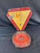 Yield sign trimmer line