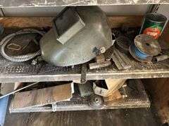Four shelves of miscellaneous hardware and tools
