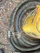 Hydraulic hose, spool of wire, and bucket of miscellaneous