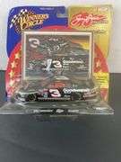 Winner's Circle 1:43 scale diecast car featuring Dale Earnhardt's #3 NASCAR Goodwrench Chevrolet, part of the Sam Bass Collection Art Print Series