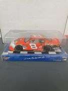 2002 Dale Earnhardt Jr. #8 Looney Tunes Rematch NASCAR diecast car, specifically a 1:24 scale model by Action Collectibles.