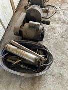 KO Lee spiral grinding fixture and a pan of grease guns and misc tools