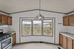 Colorado Mountain Property Auction • 5± (Two- 2.5 acres tracts)1 with Mobile Home and improvements, 1 land only