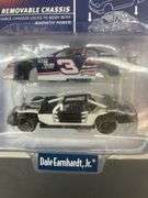 NASCAR Winner's Circle Tech Series 1:64 scale die-cast car featuring Dale Earnhardt Jr.'s #3 AC Delco Chevrolet Monte Carlo with a removable chassis.