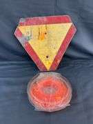 Yield sign trimmer line