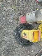 Hydraulic hose, spool of wire, and bucket of miscellaneous
