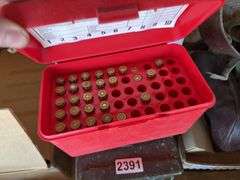 Assorted casings, ammunition box.