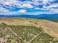 Colorado Mountain Property Auction • 5± (Two- 2.5 acres tracts)1 with Mobile Home and improvements, 1 land only