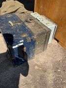 Two trunks a suitcase, and a briefcase