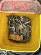 Hydraulic hose, spool of wire, and bucket of miscellaneous
