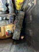 Tough box containing miscellaneous automotive fluids, and tools
