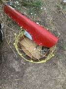 Old keys, wire basket, knives, and gun scabbard