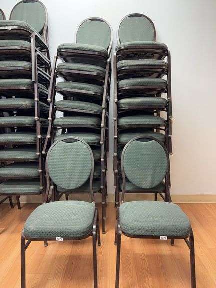Event center chairs stack of 10 (bronze colored frame green Cushions image
