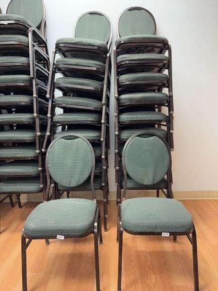 Event center chairs stack of 10 (bronze colored frame green Cushions image