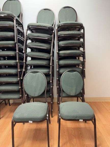 Event center chairs stack of 10 (bronze colored frame green Cushions image