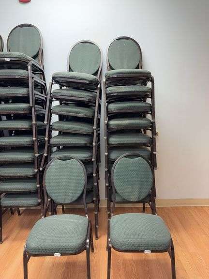 Event center chairs stack of 10 (bronze colored frame green Cushions image