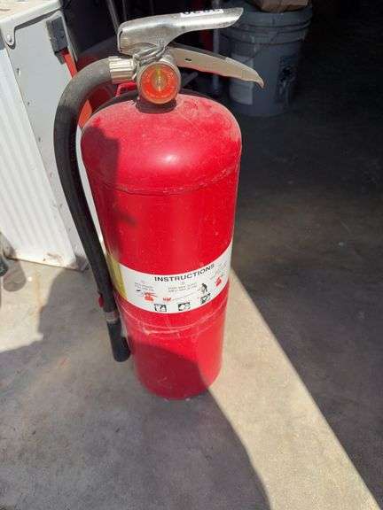 Fire extinguisher marked 1984 image