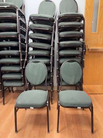 Event center chairs stack of 10 (bronze colored frame green Cushions image