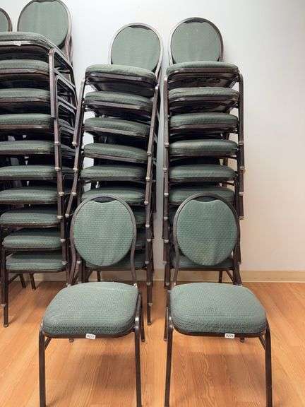 Event center chairs stack of 10 (bronze colored frame green Cushions image