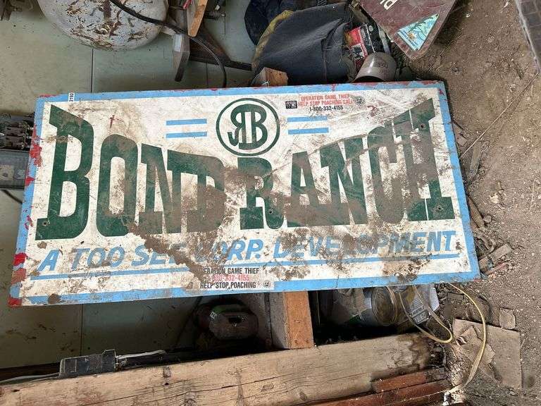 Painted wooden ranch sign