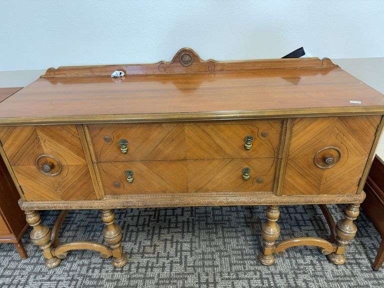 carved antique buffet/sideboard, likely 1920s–1940s image