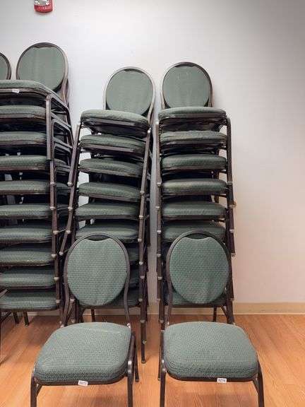Event center chairs stack of 10 (bronze colored frame green Cushions image