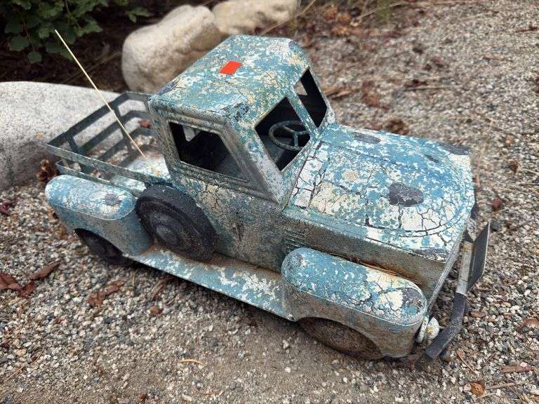 Blue Tin pick up truck image