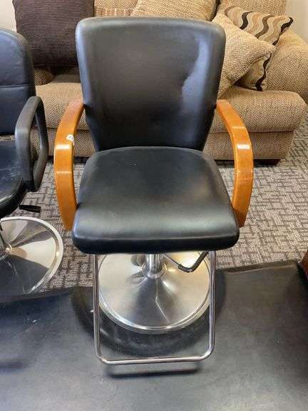 Black vinyl Barber chair with wooden armrest image
