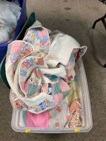 Tote of miscellaneous handmade blankets image