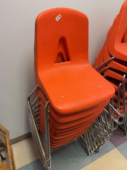 10 orange school style chairs image