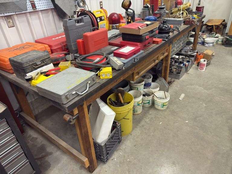 10”x4” wooden work bench. Items on and under the table not included image