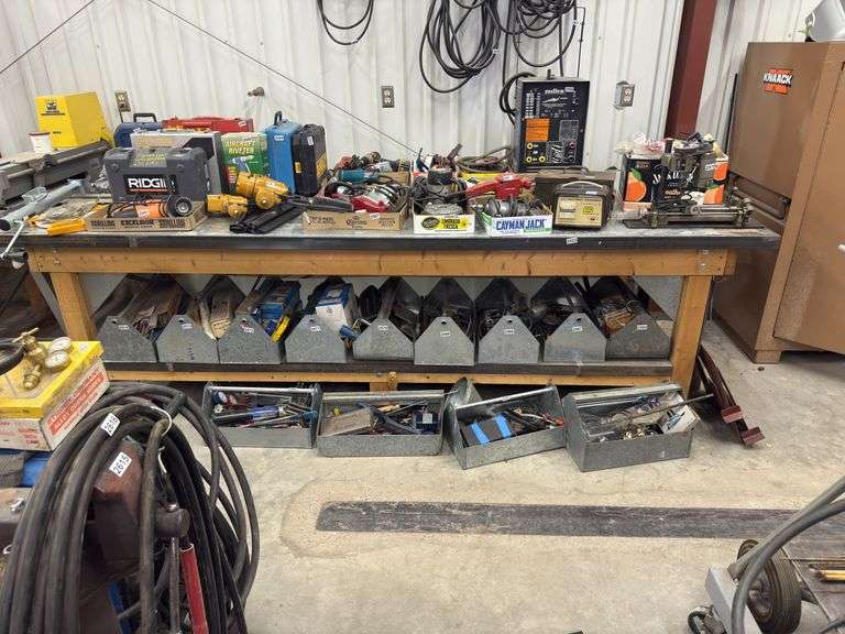 10”x4” wooden work bench. Items on and under the table not included image