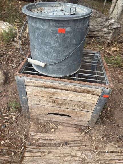 Milk crate and minnow bucket image