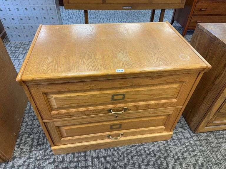 wooden lateral filing cabinet. image