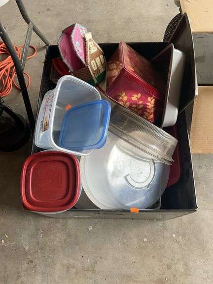Box of miscellaneous Tupperware and pans image