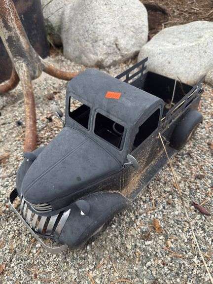 Black tin farm truck image