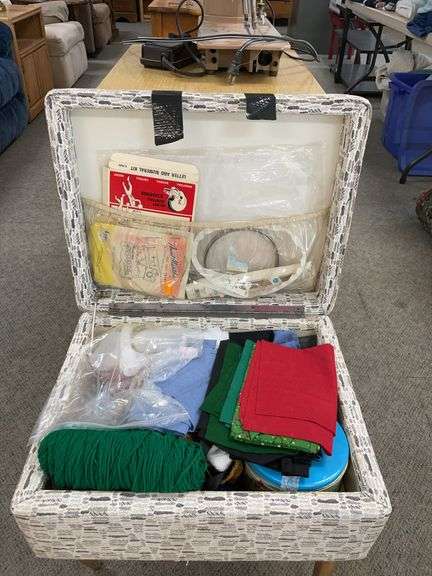 Sewing bench with miscellaneous supplies image