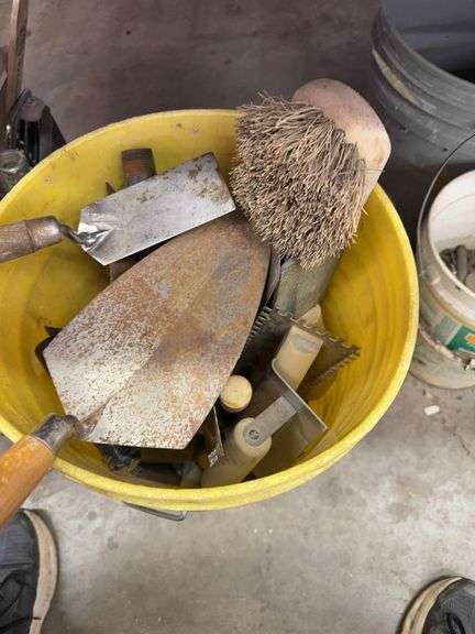 Bucket of drywall , mud tools image