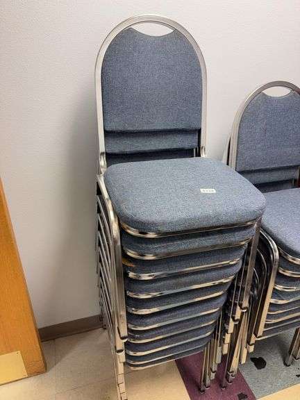 10 stainless steel framed and blue cushioned event center chairs image