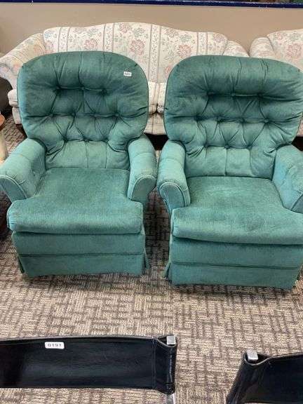 Set of two upholstered swivel chairs image