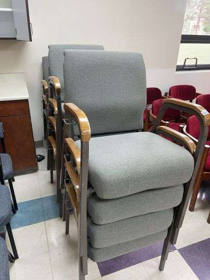 Lot of 11 metal frame with gray upholstery stacking chairs image