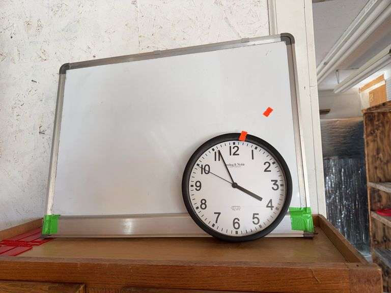 Sterling and Noble wall clock and whiteboard image
