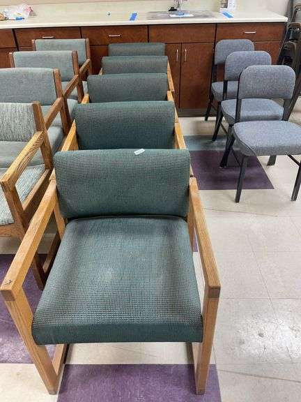 Lot of five wood and green upholstered chairs image
