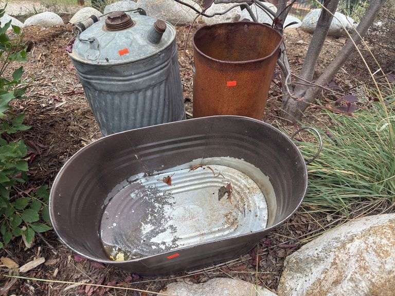 Collection of watering/ oil buckets image