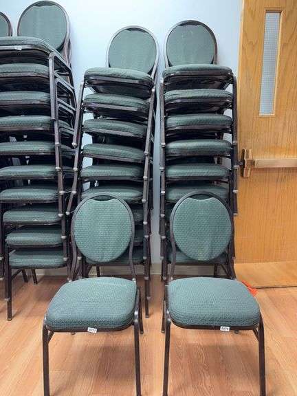 Event center chairs stack of 10 (bronze colored frame green Cushions image